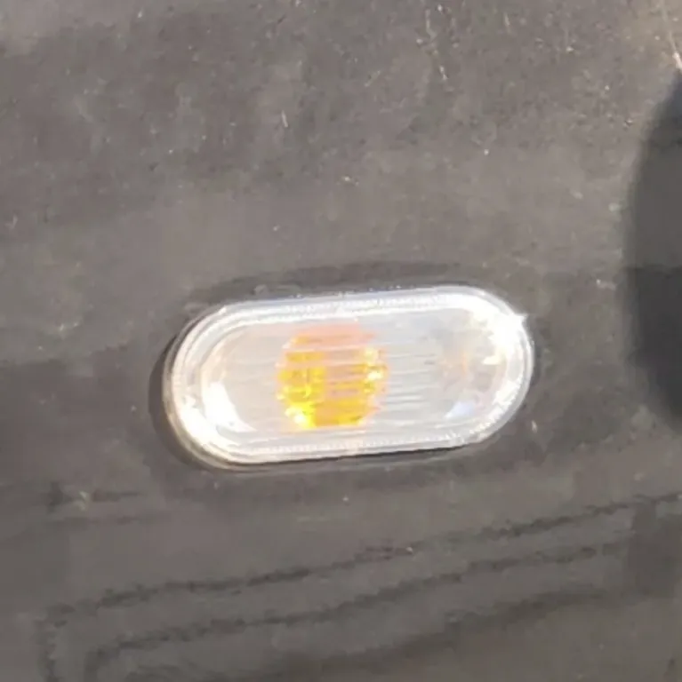 Replacement of the left fender signal housing and socket.