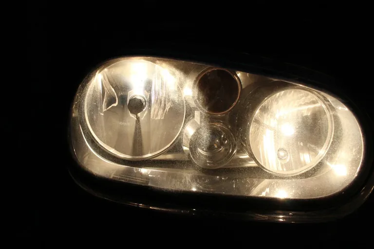 Close-up of the renewed front lighting with the new halogen low beam installed.